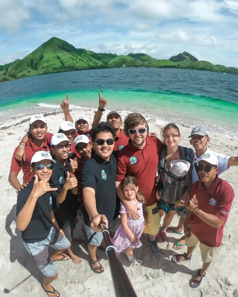 Agung Afif engaging with local Indonesian team, demonstrating Juara Holding Group's commitment to sustainable community-based tourism